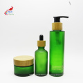 green custom cream glass jar glass pump spray lotion oil toner bottle with bamboo cap BJ-245B